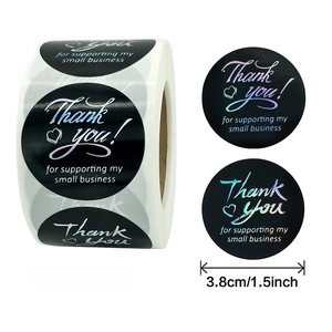 Black round roll stickers with laser Thank You lettering and heart for small business packaging