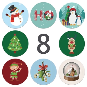 Set of 8 Christmas stickers with snowman and penguin designs for gift wrapping labels