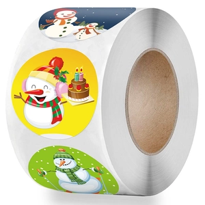 Roll of round Christmas snowman stickers for holiday gift decoration and festive crafts