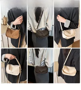 Three-way minimalist crossbody bags in brown and cream colors shown on a model