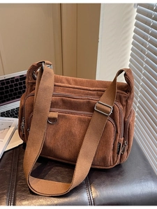Brown corduroy large tote bag with multi-zipper pockets and adjustable wide strap