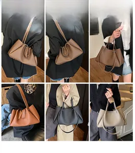 Detail view showing models wearing minimalist tote bags in brown, tan, black, and grey colors