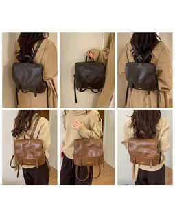 Dettaglio degli zaini in pelle vintage in marrone scuro e cammello per stile quotidiano