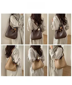 Detail shots of minimalist tote bags in dark brown and khaki with matte leather texture