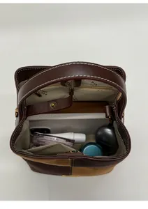 Top view of color-block tote bag showing spacious interior with pockets and daily items