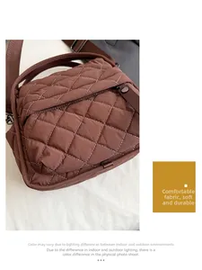 Detail of dark brown quilted shoulder bag featuring soft fabric and diamond stitching