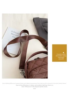 Close-up of quilted coffee brown backpack with adjustable nylon shoulder strap and silver buckle