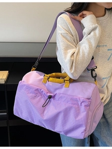 Lightweight lavender travel bag with yellow handles for fitness and short trips