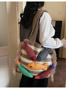 Striped knit tote bag with 3D colorful fish charms and fringe trim for women