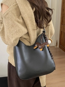 Retro black leather hobo bucket bag for women with dachshund charm and large capacity