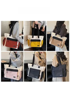 Detail showing various colors of high-capacity tote bags with side drawstring pockets