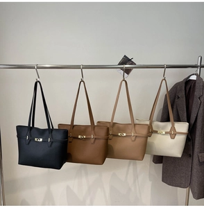 Detailed display of tote bags in black, caramel, khaki, and beige leather textures