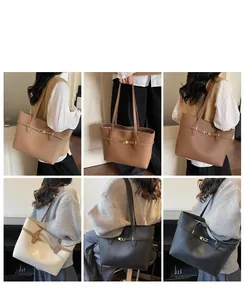 Detail shots of large capacity tote bag in brown, beige and black with golden buckle