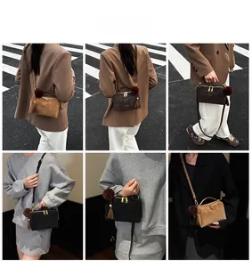 Vues détaillées des sacs à main vintage avec double zip doré et pompon en fausse fourrure