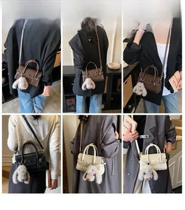 Three-color mini crossbody bags set with plush bunny charms and adjustable straps