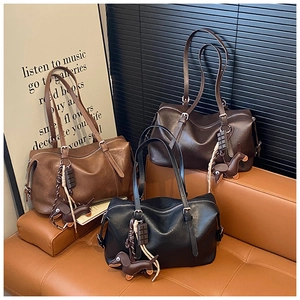 Retro faux leather tote bags in caramel, brown and black with dachshund puppy pendants
