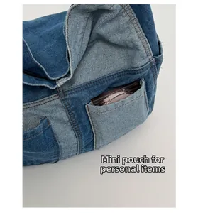 Detail of denim tote bag with mini pocket holding a cosmetic item for daily essentials
