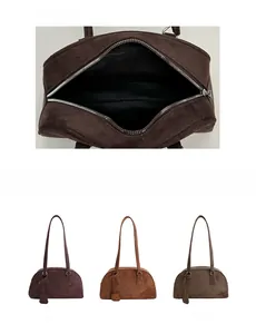Internal zipper closure and color options for the vintage suede Boston bag
