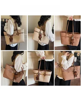 Detailed views of high-capacity tote bag with metal buckle and cute bear pendant charm