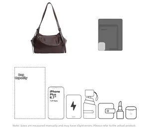 Large vintage brown leather tote bag capacity display for daily essentials and phone