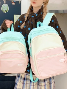 Macaron color-block backpacks in two sizes for students with a minimalist casual design