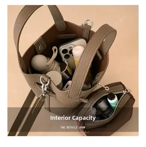 Top view of large capacity litchi leather bucket bag and pouch with interior storage space