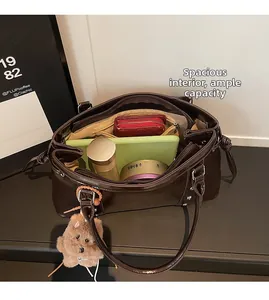 Interior view of large capacity tote bag showing compartments and organized storage space