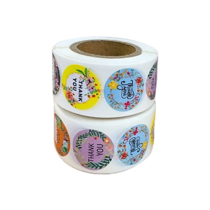 Two rolls of colorful floral Thank You adhesive seal stickers for gift packaging decoration