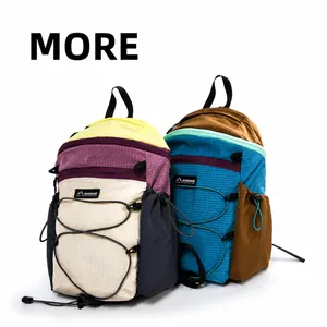Detail of water-resistant foldable outdoor backpack with ripstop fabric and bungee cord