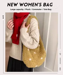 Detail of large capacity mustard yellow plush tote bag with white star pattern design