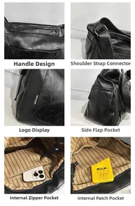 Macro view of black leather tote details including metal rings and brand woven label