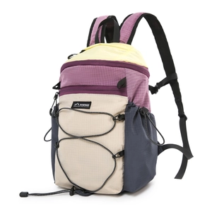 Macro detail of tear-resistant fabric texture and bungee cord system on outdoor backpack