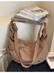 Minimalist large capacity crossbody dumpling bag with drawstring and wide strap
