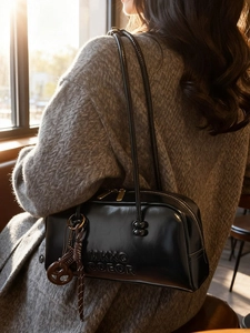 Vintage black shiny Boston shoulder bag with embossed letters and metal zipper