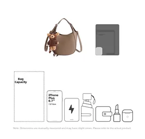 Macro view of brown bucket bag capacity showing size comparison with 6.7 inch smartphone