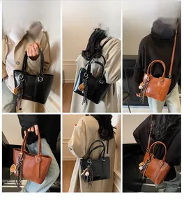 Detailed model views showing versatile carrying styles of glossy leather tote bag with scarf