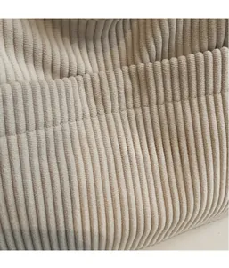 Close-up of lightweight beige corduroy fabric texture for women shoulder tote bag