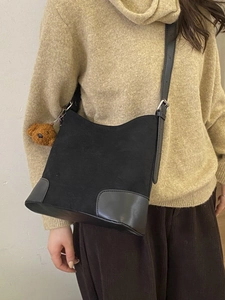 Retro black matte bucket bag with adjustable leather strap and cute bear charm