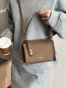 Brown vintage square faux leather shoulder bag with gold hardware and top handle