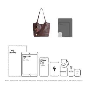 Detailed internal capacity view of brown leather tote bag showing iPad and phone compatibility
