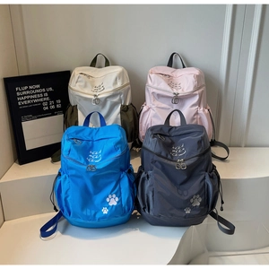 Groupe de sacs à dos en nylon léger avec broderie patte de chat en quatre coloris tendance
