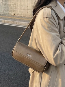 Minimalist vintage brown leather baguette underarm bag with silver BB metal logo for women