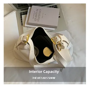 Internal capacity of the white tote bag showing spacious interior with black lining