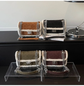 Multiple colors of quilted chain bags with suede texture and faux fur trim detail