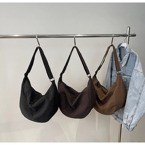 Chic waffle pattern hobo tote bag in black, brown, and khaki with adjustable strap