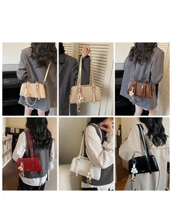 Fashionable textured faux leather shoulder bag with floral charm available in six colors