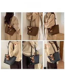 Detailed comparison of coffee and black leather tote bags with bear charm on a model