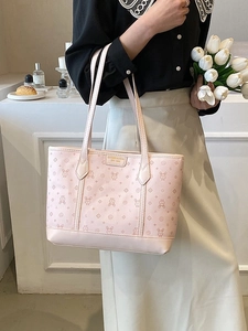 Pink large capacity tote bag with monogram pattern and gold logo plaque for daily commute