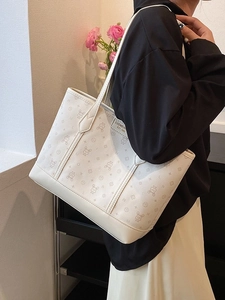 Large white tote bag with cartoon rabbit prints and long straps for shoulder wear