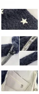 Dettaglio borsa shopper in peluche blu scuro con stelle e tasca interna con zip